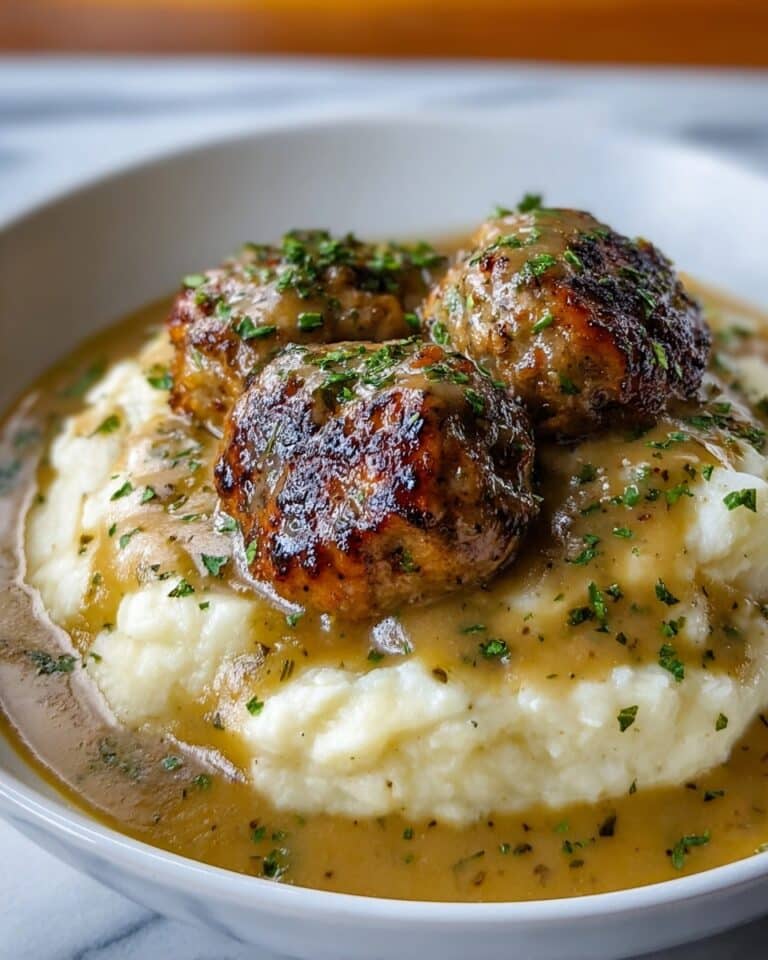 Savory Smothered Chicken Thighs with Creamy Gravy Recipe